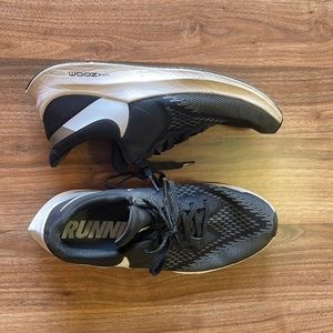 Well worn Nike athletic shoes